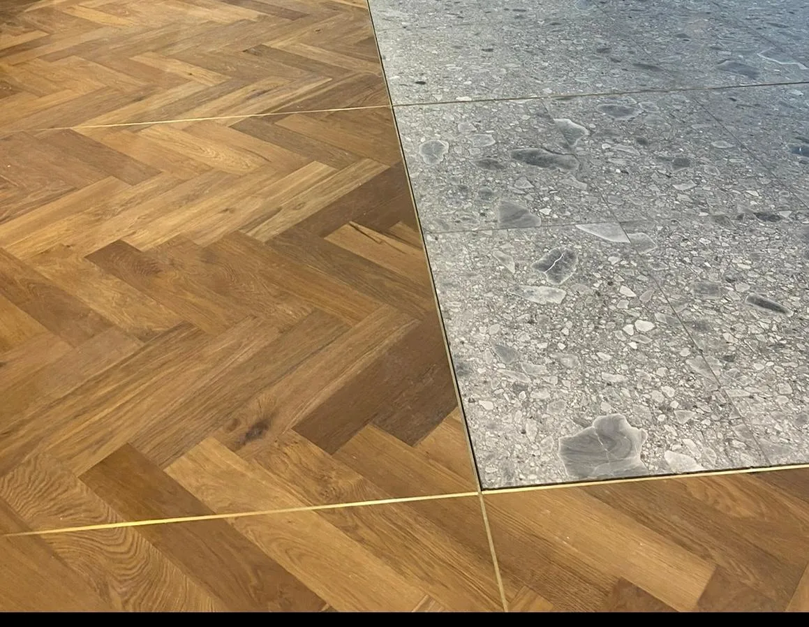 Engineered oak - herringbone brass trim inlay